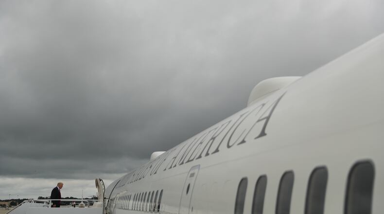 President Donald Trump boards Air Force One at Andrews Air Force Base, Md., Wednesday, June 7, 2017, to travel to Cincinnati, Ohio to give remarks on healthcare and infrastructure. (AP Photo/Andrew Harnik)