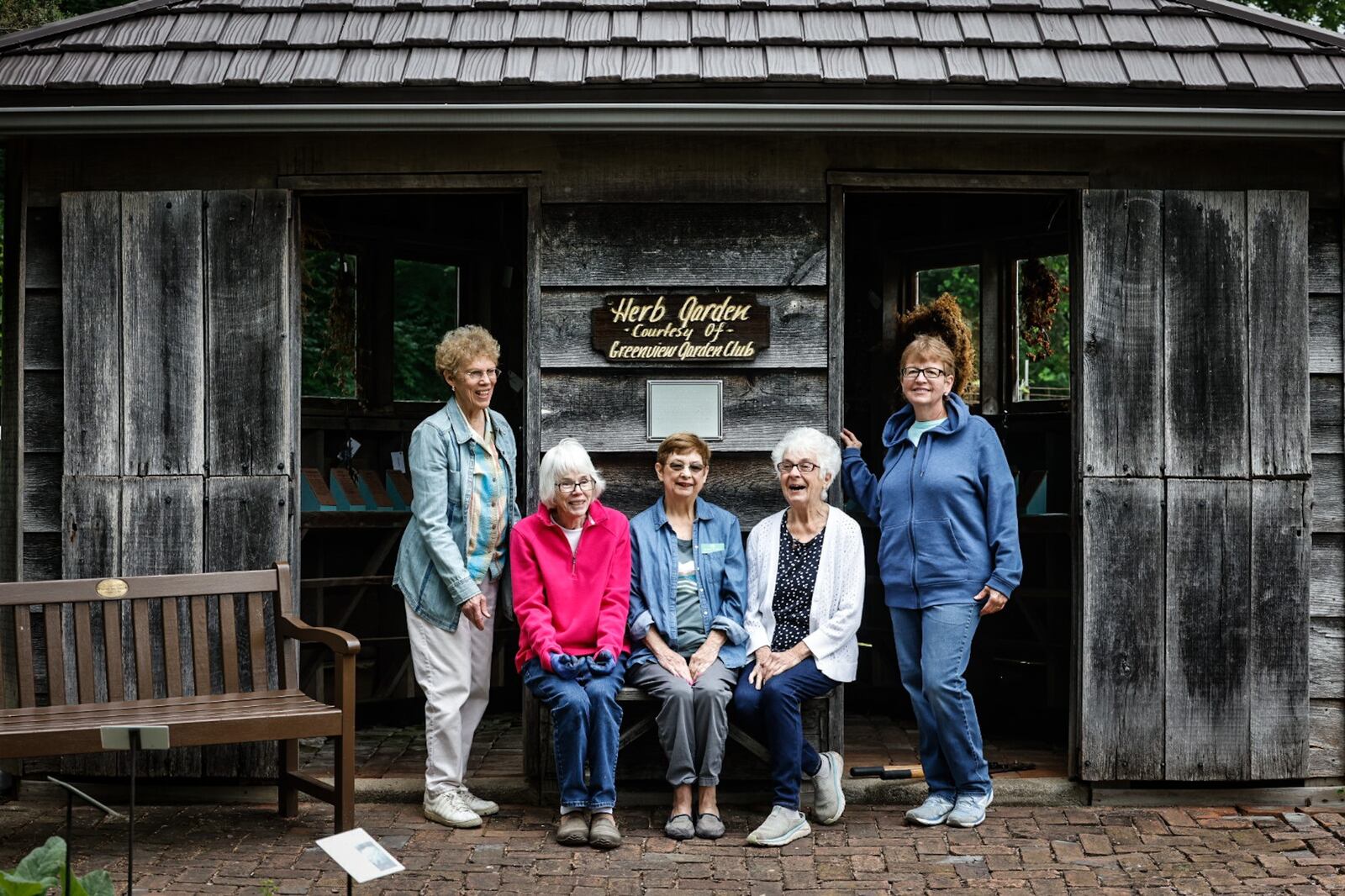 Greenview Garden Club members, from left Jane Peterson, Barbara Zeier, Kathie Menker, Nancy Duncan and Ginnie Boord have been taking care of the herb garden at Aullwood Farm. JIM NOELKER/STAFF