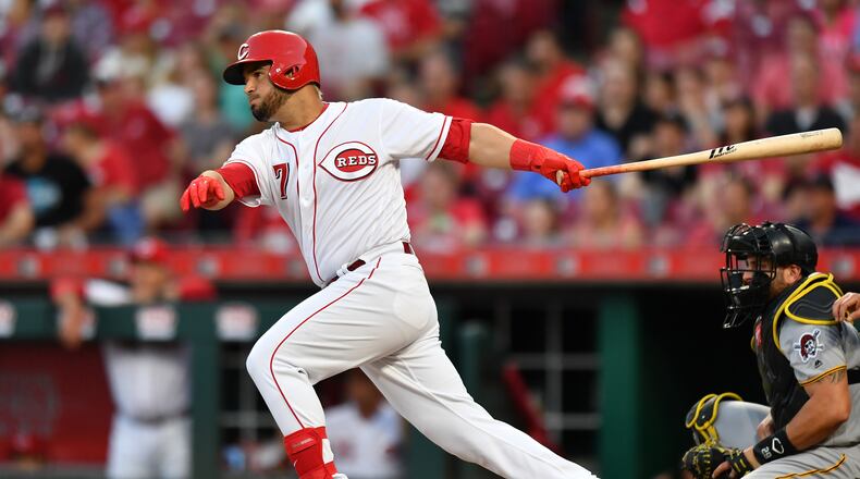 CINCINNATI, OH - MAY 23: Eugenio Suarez #7 of the Cincinnati Reds hits a single in the fourth inning against the Pittsburgh Pirates at Great American Ball Park on May 23, 2018 in Cincinnati, Ohio. Pittsburgh defeated Cincinnati 5-4 in 12 innings. (Photo by Jamie Sabau/Getty Images)