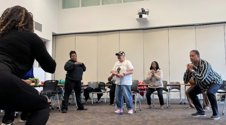 Marcy Walker of Mission: Fit leading the exercise portion of a PACE Program class, including participants Zontaye Richardson, Carole Balger, Donecha Daniels, and John Payne. Public Health - Dayton and Montgomery County launched the PACE Program to help prevent hypertension after getting a grant from the Ohio Commission on Minority Health. CONTRIBUTED