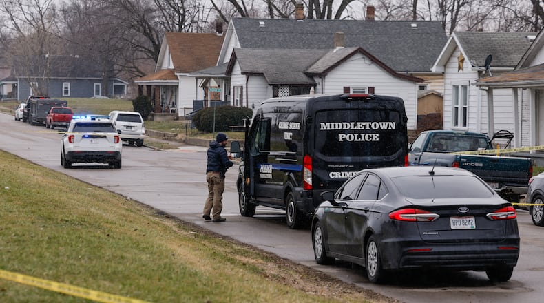 Police tape surrounds a home on Roosevelt Boulevard in Middletown. NICK GRAHAM / STAFF