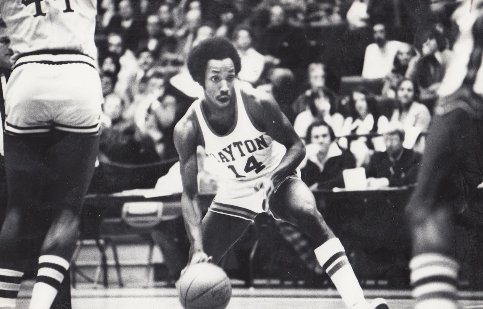 Dayton guard Johnny Davis dribbles in a 1976 game at UD Arena. Three of the top-20 scorers in UD history played in the 1970s: Jim Paxson Sr.; Donald Smith; and Davis. Dayton Daily News photo by Wally Nelson
