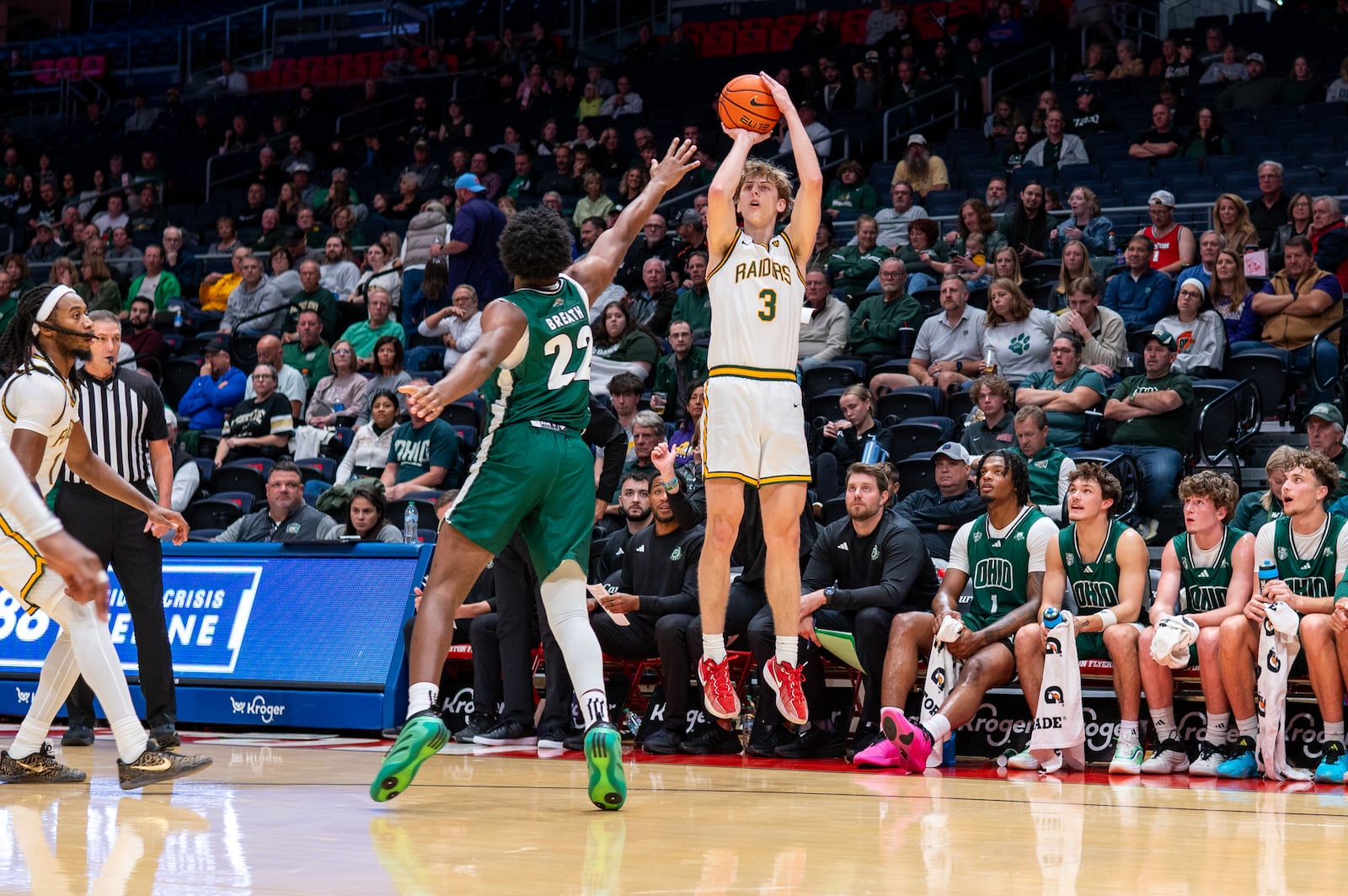 Wright State University Dominic Pangonis shoots over an Ohio University defender during their preseason game on Monday, Oct. 20 at UD Arena. The Raiders beat the Bobcats 63-57. WRIGHT STATE ATHLETICS / CONTRIBUTED PHOTO