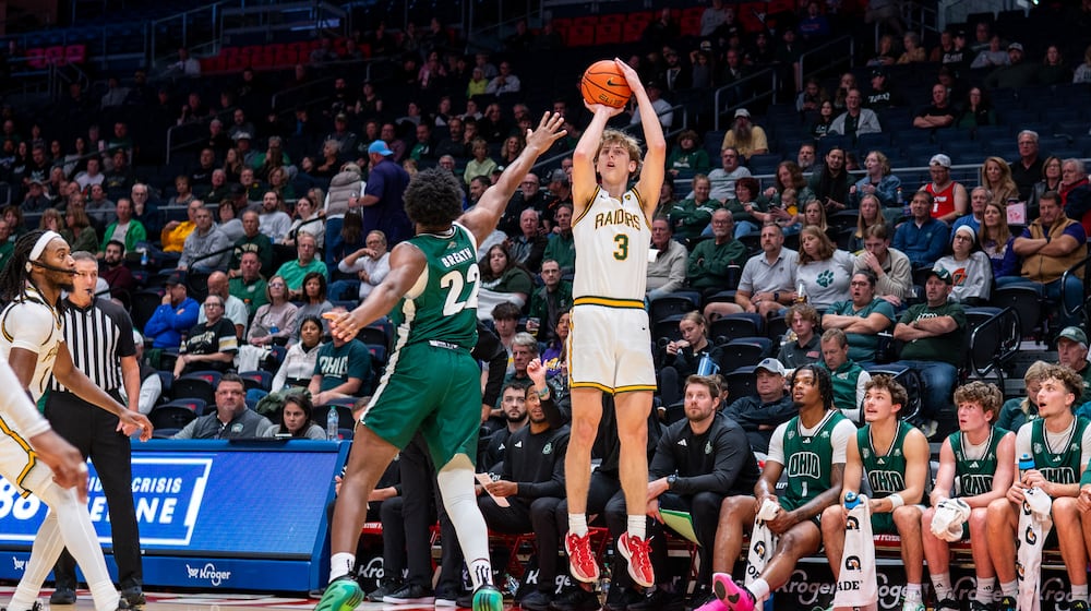 Wright State University Dominic Pangonis shoots over an Ohio University defender during their preseason game on Monday, Oct. 20 at UD Arena. The Raiders beat the Bobcats 63-57. WRIGHT STATE ATHLETICS / CONTRIBUTED PHOTO