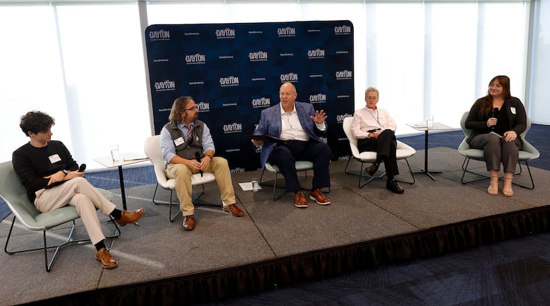 The Dayton Daily News staff took part in a panel discussion Thursday, Nov. 7, 2024 that focused on the effects on business from the election results. Members of the panel from left, Avery Kreemer, Josh Sweigart, Lynn Hulsey and Sydney Dawes. The event was hosted by Dayton Area Chamber of Commerce President Chris Kershner (center) MARSHALL GORBY\STAFF