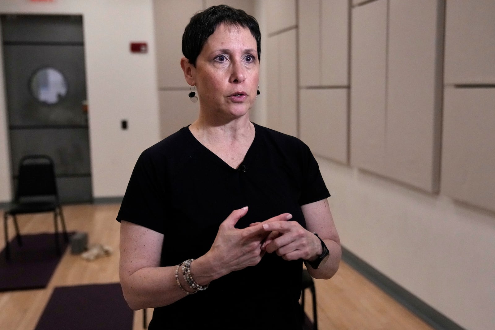 Instructor Whitney Chapman talks about her chair yoga class at the Marlene Meyerson JCC Manhattan, in New York, March 28, 2025. (AP Photo/Richard Drew)