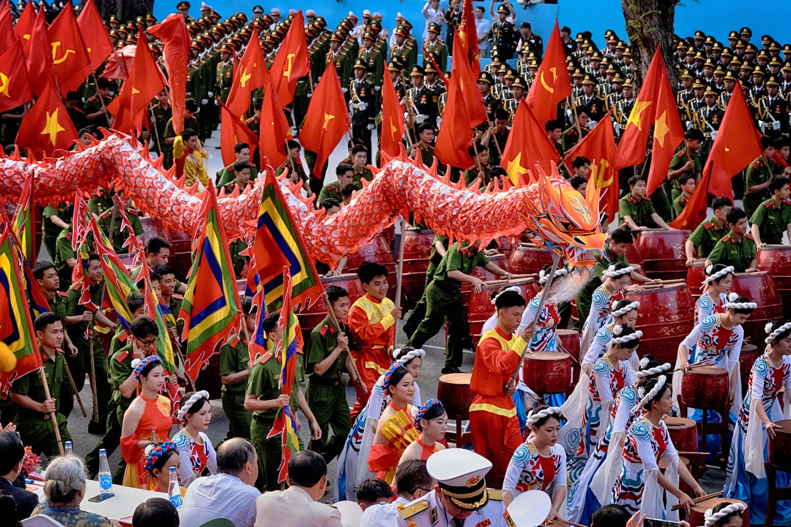 Vietnamese performers participate during a parade celebrating the 50th anniversary of the end of the Vietnam War on Wednesday, April 30, 2025, in Ho Chi Minh City, Vietnam. (AP Photo/Richard Vogel)