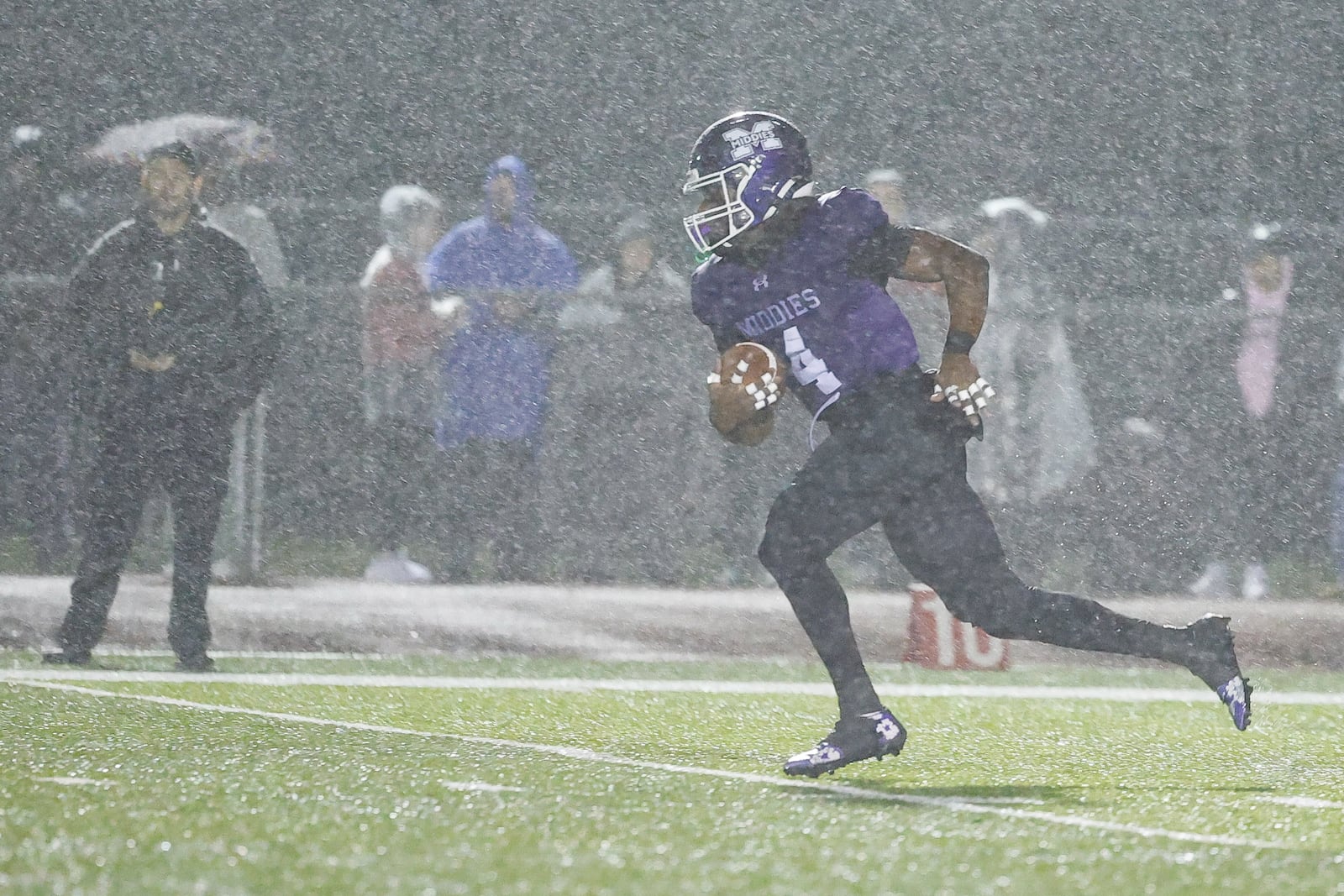 Middletown's Jordan Vann returns a kickoff for a touchdown during their Division I Regional football final against Wayne Friday, Nov. 21, 2025 at Trotwood Madison High School. Middletown won 21-14 to advance. NICK GRAHAM/STAFF
