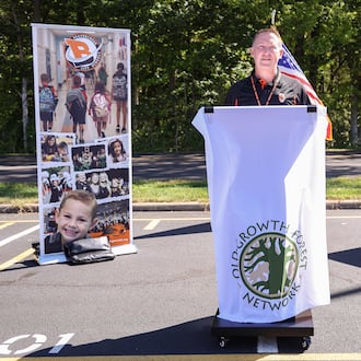 Beavercreek City Schools superintendent Paul Otten speaks during a ceremony on Wednesday, Oct. 1 in the parking lot of Beavercreek High School. The ceremony was in recognition of Ferguson Land Lab being added to Old Growth Forest Network. The forest is located east of the school. BRYANT BILLING / STAFF