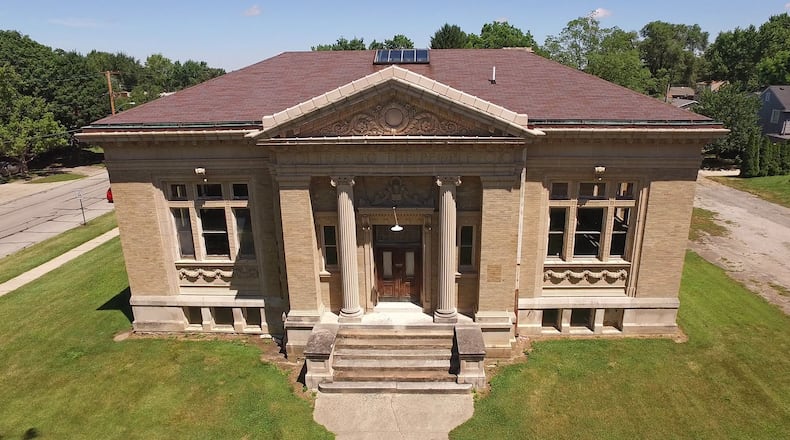 Officials are working to market the former Xenia Carnegie Library in hopes of finding a new tenant for the building, which has been vacant for 20 years. The library is located just a few blocks from the city center. TY GREENLEES / STAFF