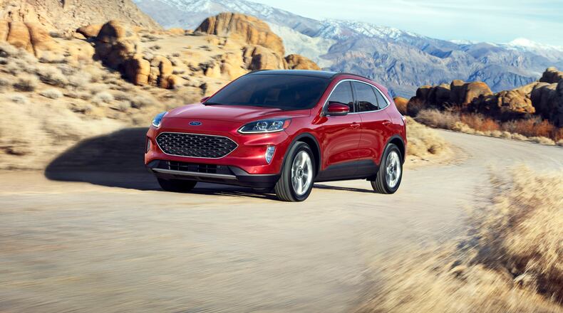 This photo provided by the Ford Motor Co. shows the 2021 Ford Escape Hybrid, a small hybrid crossover SUV that's still roomy and comfortable. ( David Westphal/Ford Motor Co. via AP)