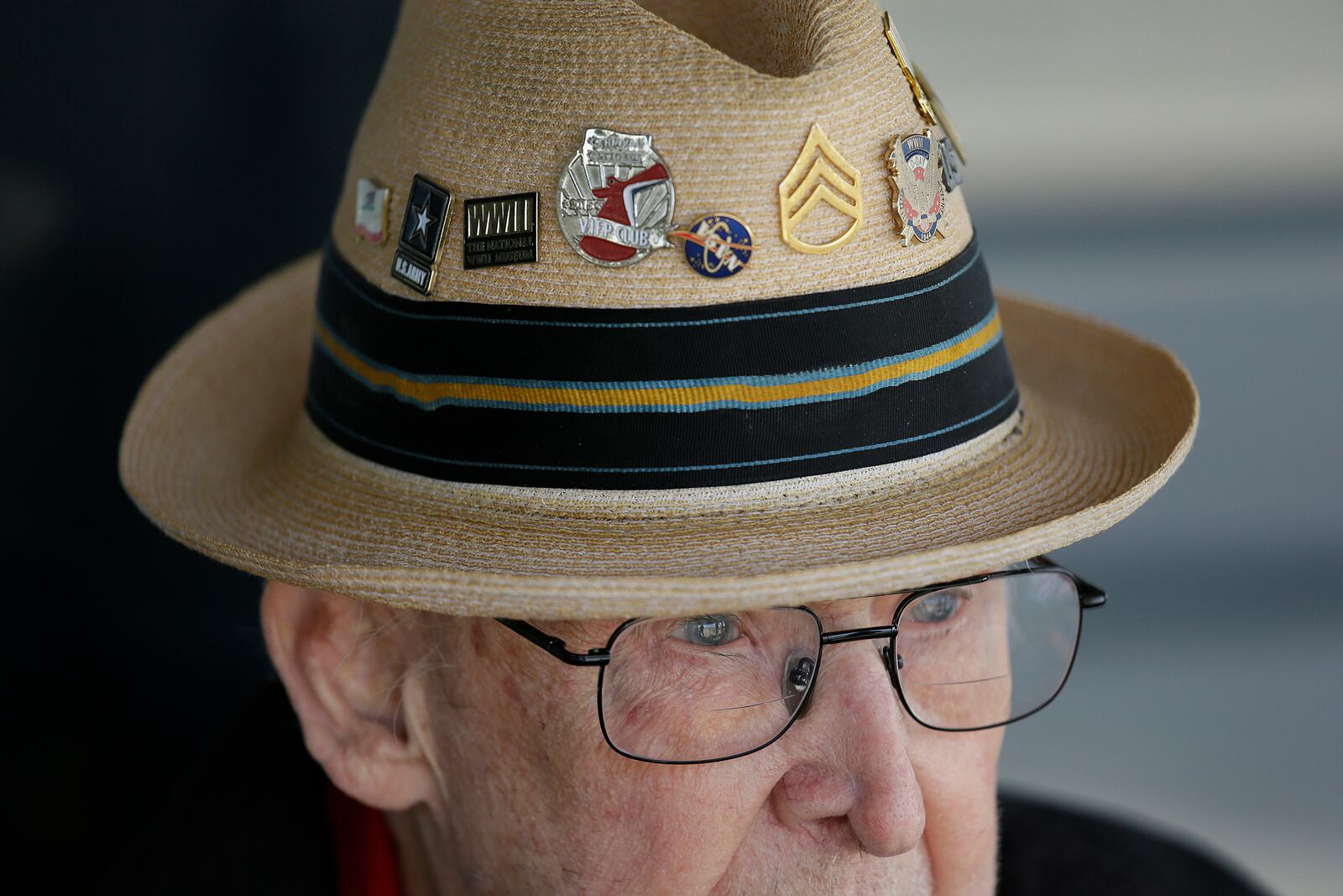 FILE - In this photo taken April 29, 2019, D-Day veteran Jake Larson watches as the "The Spirit of Benovia" WWII-era aircraft lands in Oakland, Calif. (AP Photo/Eric Risberg, file)