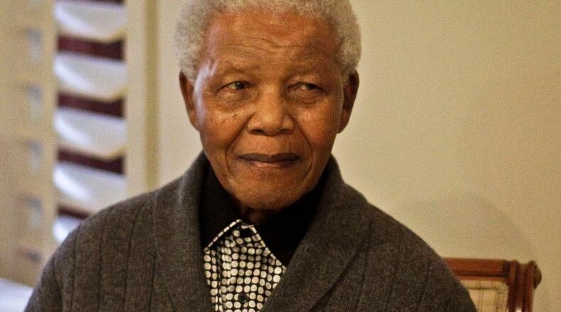This July 18, 2012 file photo shows former South African President Nelson Mandela during the celebration of his 94th birthday in Qunu, South Africa. AP Photo.