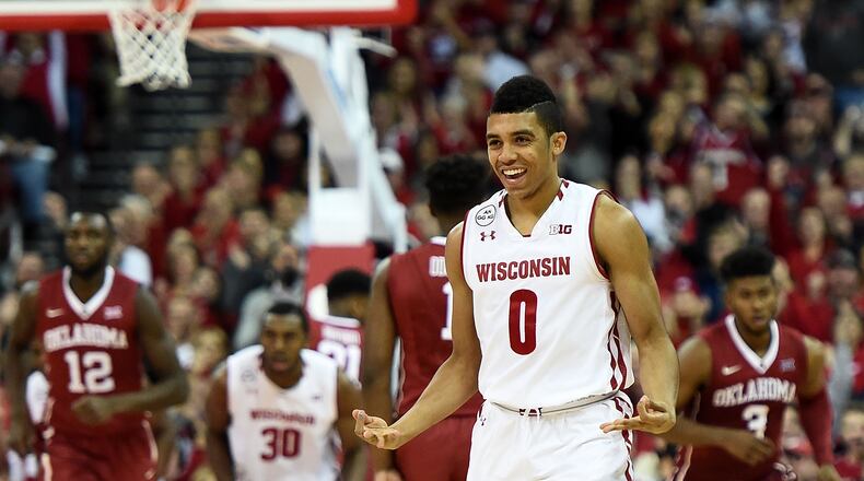 MADISON, WI - DECEMBER 03: D'Mitrik Trice #0 of the Wisconsin Badgers reacts after a three point shot during the second half of a game against the Oklahoma Sooners at the Kohl Center on December 3, 2016 in Madison, Wisconsin. (Photo by Stacy Revere/Getty Images)