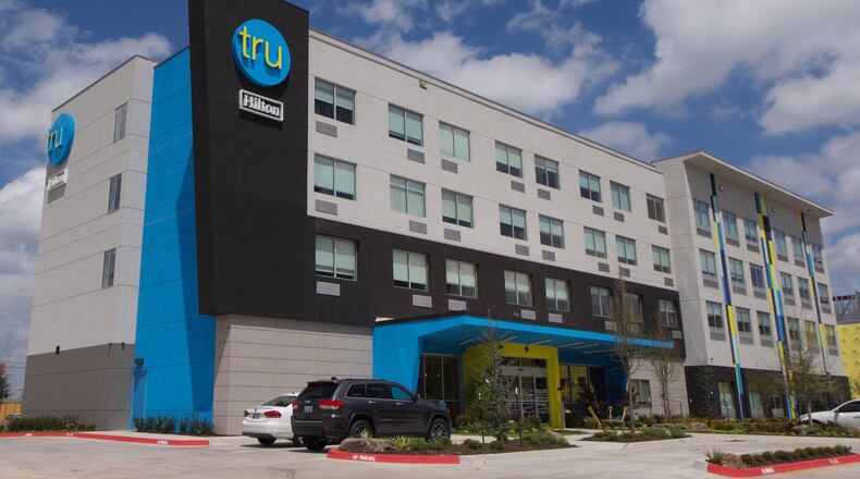 A rendering shows the exterior of a planned Tru by Hilton in another location. CONTRIBUTED