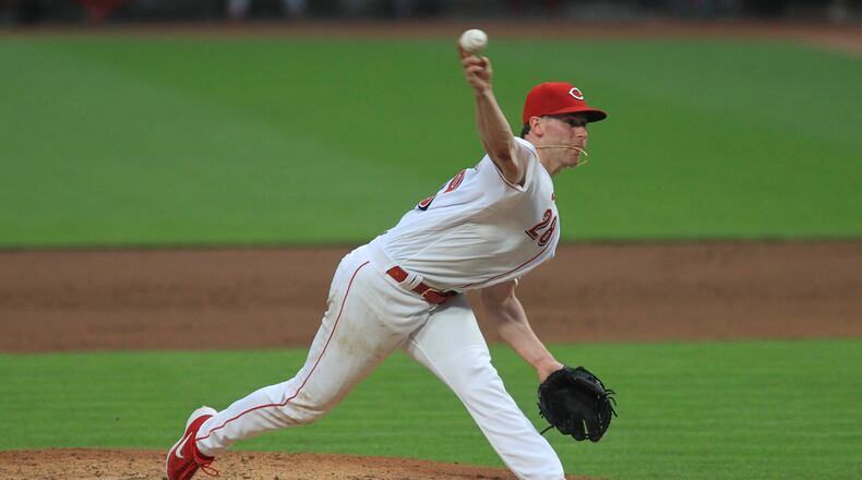 Reds starter Anthony DeSclafani pitches against the Cardinals on Monday, Aug. 31, 2020, at Great American Ball Park in Cincinnati. David Jablonski/Staff