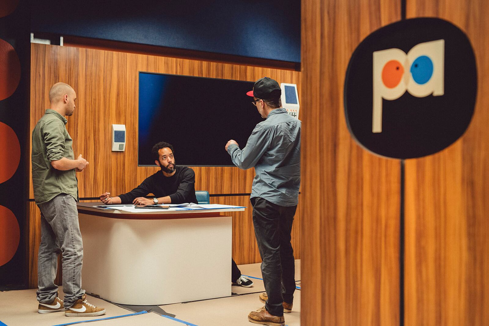 Segment director Edmond Hawksin, from left, Wyatt Cenac  and director of photography Graham Willoughby go over blocking on the set of Wyatt Cenac’s Problem Areas. (Bryan Derballa/The New York Times)
