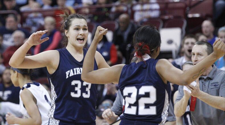 Kathryn Westbeld (33) and Chelsea Welch (22) of Fairmont react to a foul during Saturday’s Division I state championship basketball game against Twinsburg at the Jerome Schottenstein Center in Columbus on March 16, 2013. Fairmont won the game 52-48 to claim the state title. Barbara J. Perenic/Staff