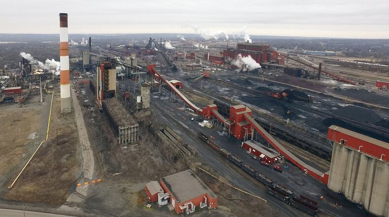 Aerial view of the AK Steel Middletown Works. The big steel producer covers more than 2,700 acres in the city to operate coke ovens, a blast furnace, hot strip mill and more than a dozen other steel production related processes. TY GREENLEES / STAFF