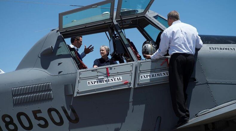 Secretary of the Air Force Heather Wilson meets with participants from the Light Attack Experiment at Holloman Air Force Base, N.M., Aug. 9. Wilson had an immersion tour of Holloman and was there for a live-fly experiment with off-the-shelf aircraft. The Air Force is pursuing a Light Attack Capabilities Experimentation Campaign, which has grown out of our Close Air Support Experimentation Campaign. The campaign is being led by the Air Force Strategic Development Planning and Experimentation Office at Wright-Patterson AFB. (U.S. Air Force photo/Airman 1st Class Alexis Docherty)