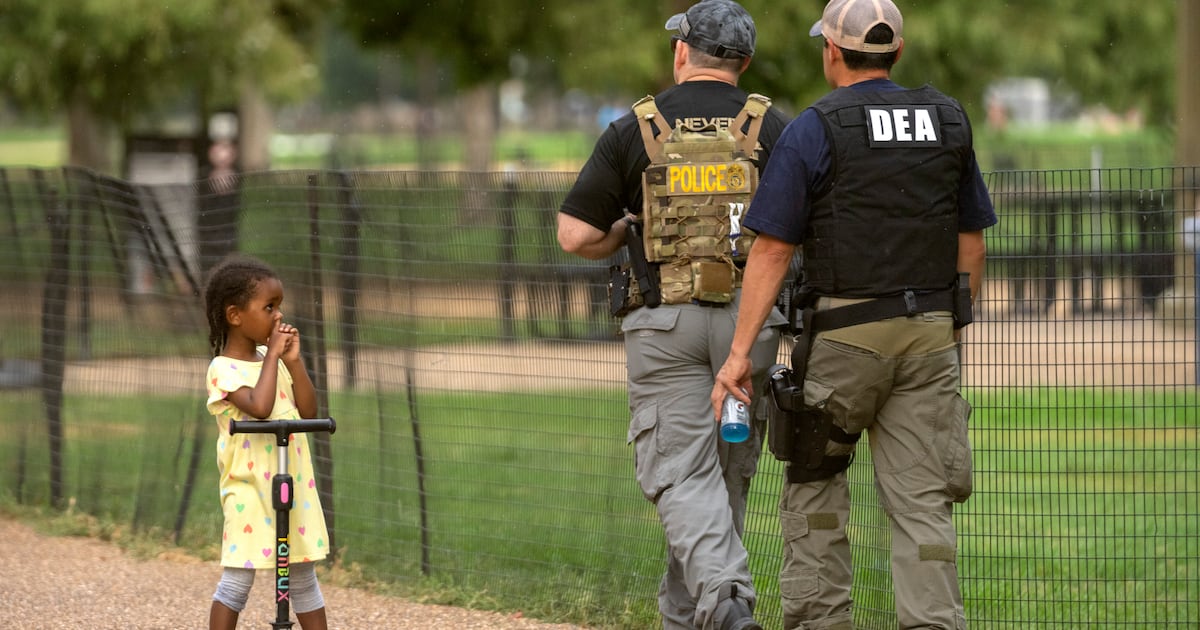 The Latest: Dozens arrested in Washington as White House ratchets up federal police presence