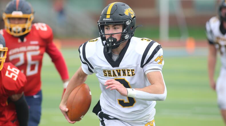 Shawnee High School junior RJ Griffin runs the ball during their Division V, Region 20 playoff game against Purcell Marian on Saturday afternoon at Walnut Hills High School in Cincinnati. Griffin scored two touchdowns as the Braves won 21-16. CONTRIBUTED PHOTO BY MICHAEL COOPER
