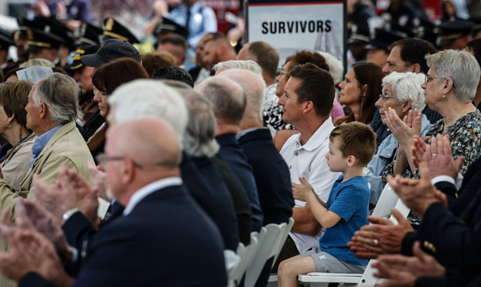 Survivors of police officers who were killed while on duty attended the 17th annual Montgomery County Law Enforcement Memorial Ceremony May 3 at RiverScape Five Rivers Metro Park. JIM NOELKER/STAFF