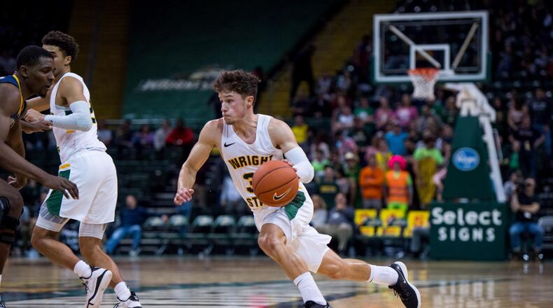 Wright State point guard Cole Gentry pushes the ball up court against Kent State on Nov. 16, 2019, at the Nutter Center. Joseph Craven/WSU Athletics