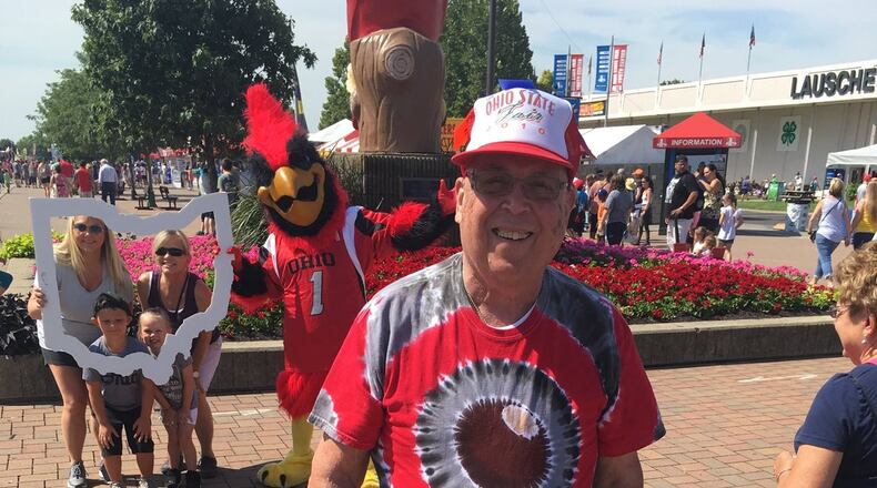 William Smith stands by a brick that commemorates his attendance at the Ohio State Fair.
