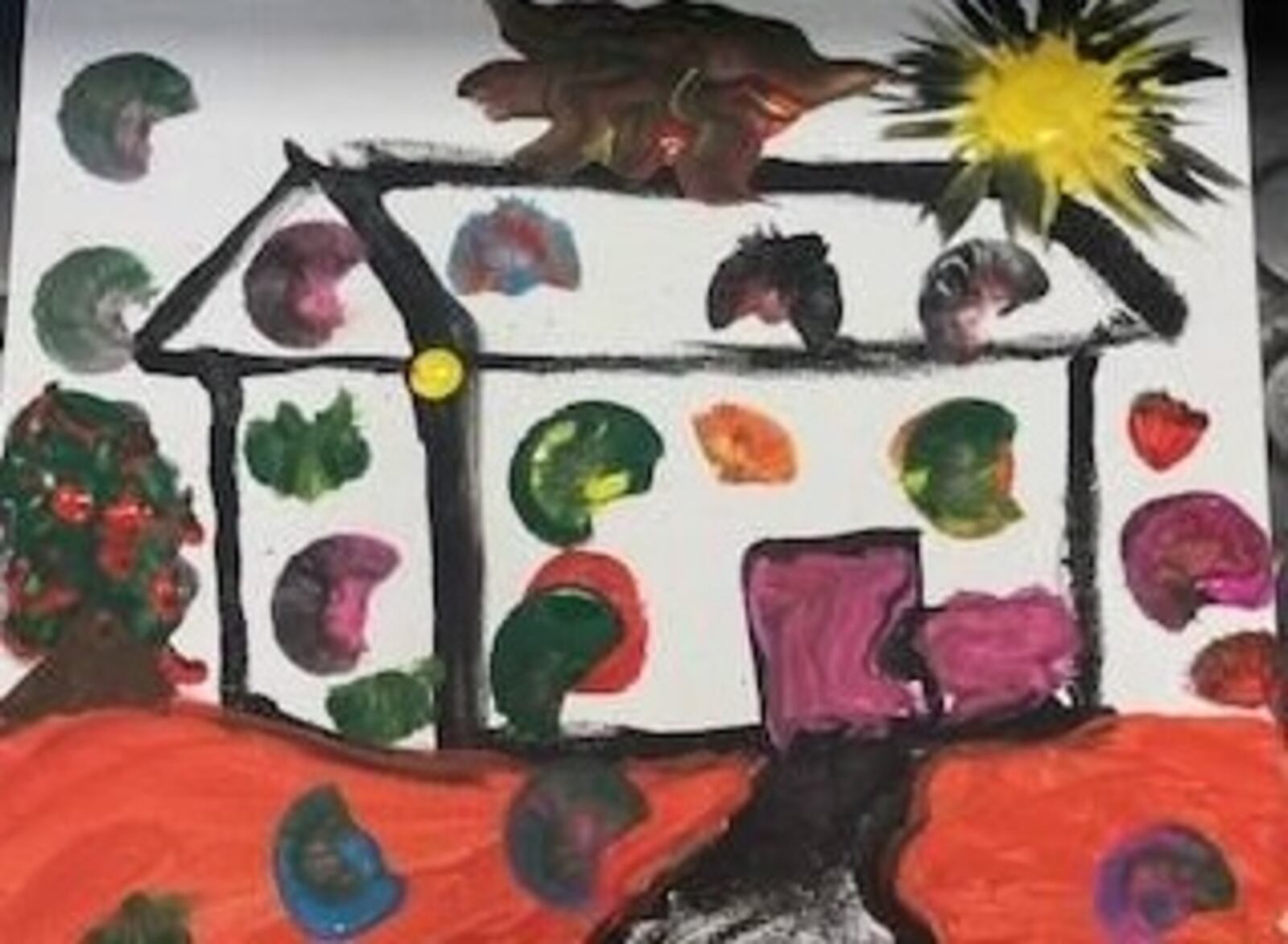 This image was created at a summer camp that took place last summer for children experiencing housing insecurity. It was a two-day workshop sponsored by the International Peace Museum. Children painted their dream houses. Over 100 children participated. PHOTO BY KATHERINE ROWELL