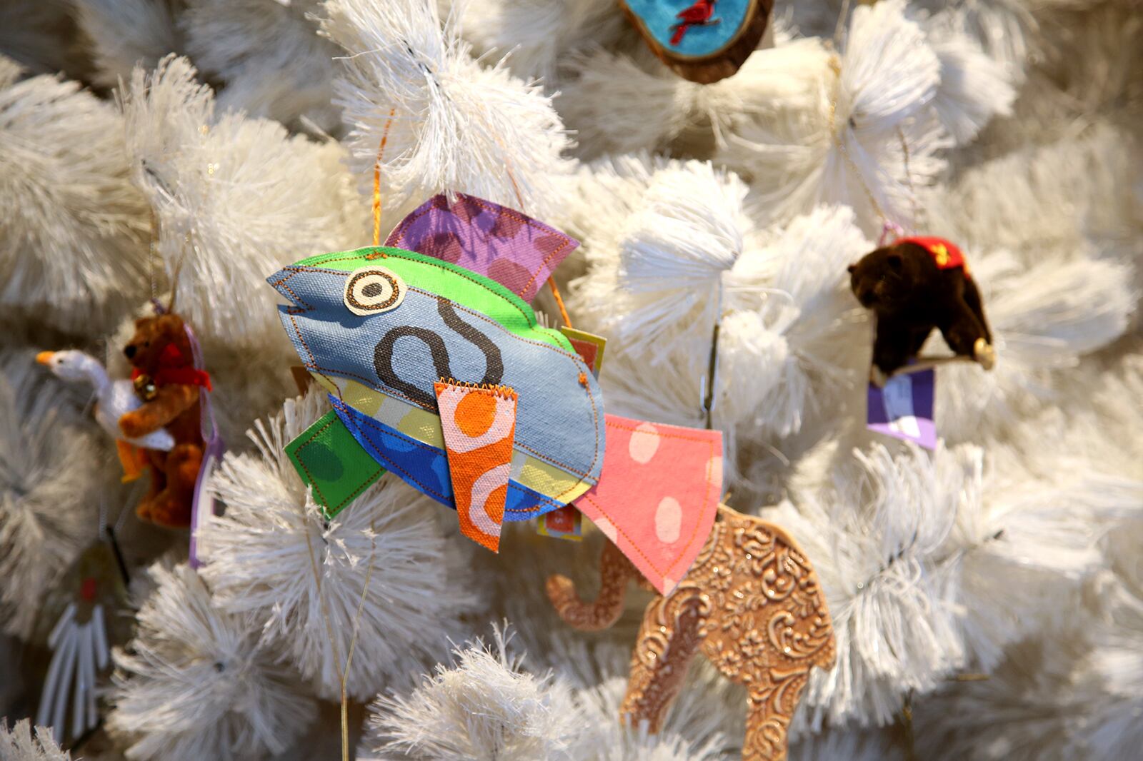 Twenty-five artists created ornaments in their medium and style for The Contemporary Dayton Holidya Gift Gallery. Each artist made a limited edition of 25 for the year. All are priced under $25. LISA POWELL / STAFF
