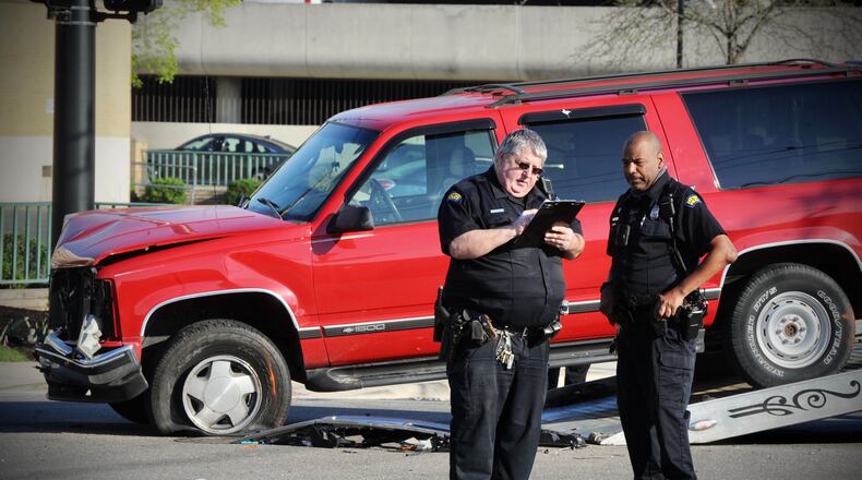 An SUV hit a fire truck that was on an emergency run at the intersection of Wyoming and Brown streets Monday, April 19, 2021. MARSHALL GORBY\STAFF