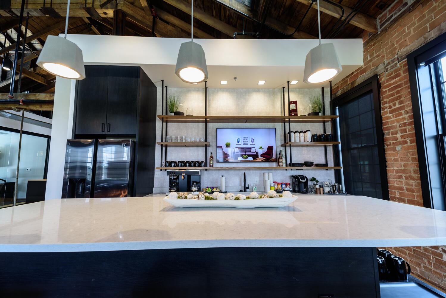 PHOTOS: A look inside the completed Brackett Builders headquarters at Madison on First in downtown Dayton