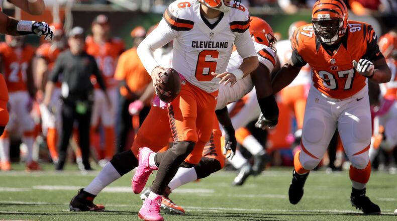 Browns quarterback Cody Kessler scrambles during an October 23, 2016 game against the Bengals at Paul Brown Stadium. He's competing for the starting job with Brock Osweiler, Kevin Hogan and rookie DeShone Kizer.