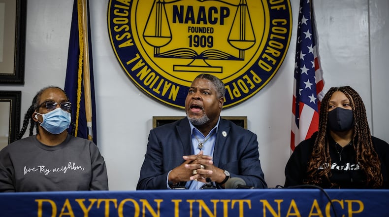 From left, Michelle Cooper, Derrick Foward and Brittney Cooper talk to the Dayton media about LYFT's responsibility for the death of a Dayton driver Brandon Cooper. JIM NOELKER/STAFF
