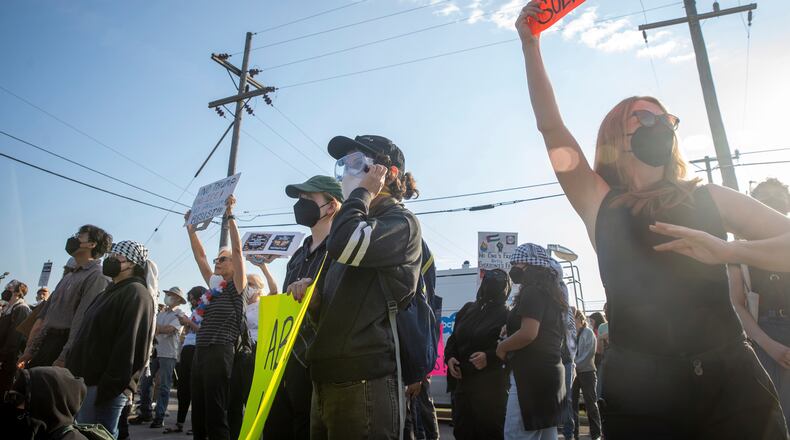 FILE - Protesters demonstrate outside of the Immigration and Customs Enforcement facility in Broadview, Ill., Sept. 19, 2025. (Zubaer Khan/Chicago Sun-Times via AP, file)