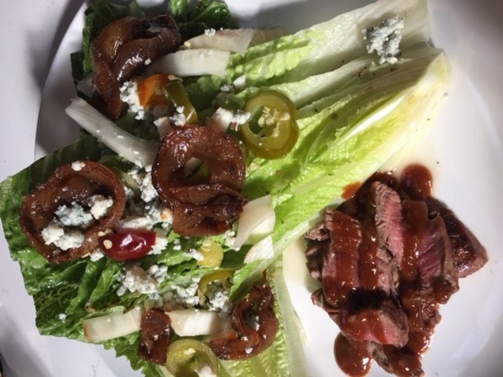 Coco’s Bistro has added to the menu a steak salad ($19.50) with a house steak sauce glazed tenderloin, romaine wedge, Gorgonzola, marinated cherry peppers, charred red onion, pickled fennel and white balsamic vinaigrette. CONTRIBUTED
