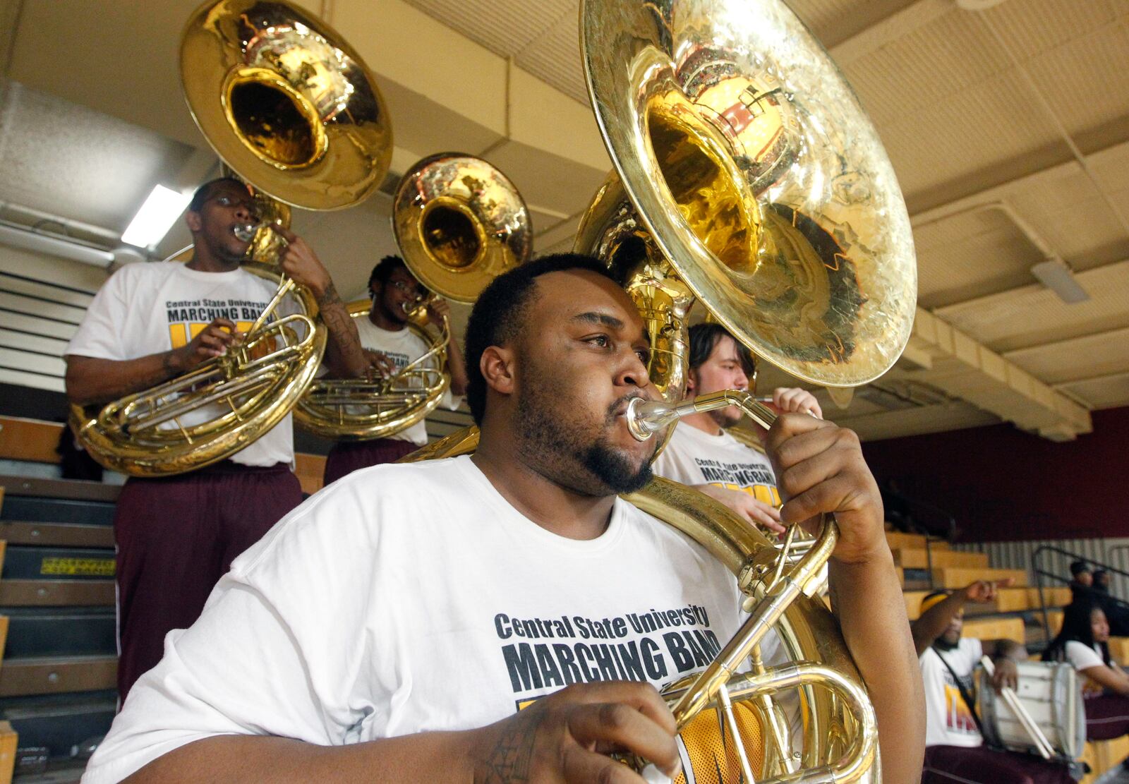 Antoine Monroe, a junior at Central State University, performs on the sousaphone with the Invincible Marching Marauders as the Central State men's and women's basketball teams took on Ohio Valley University Thursday in Wilberforce. The band performs at all of the home games. The next home game will be Thursday Feb. 27 against Salem International University. LISA POWELL / STAFF
