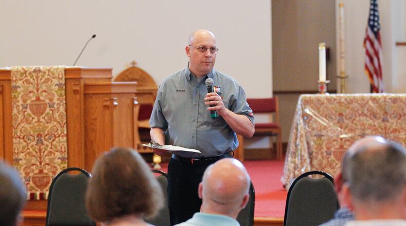Jeff Jordan, Montgomery County’s emergency management director, talks to about 80 people who gathered at St. Margaret’s Episcopal Church in Trotwood on June 19, 2019, to plan long-term tornado recovery efforts. CHRIS STEWART / STAFF