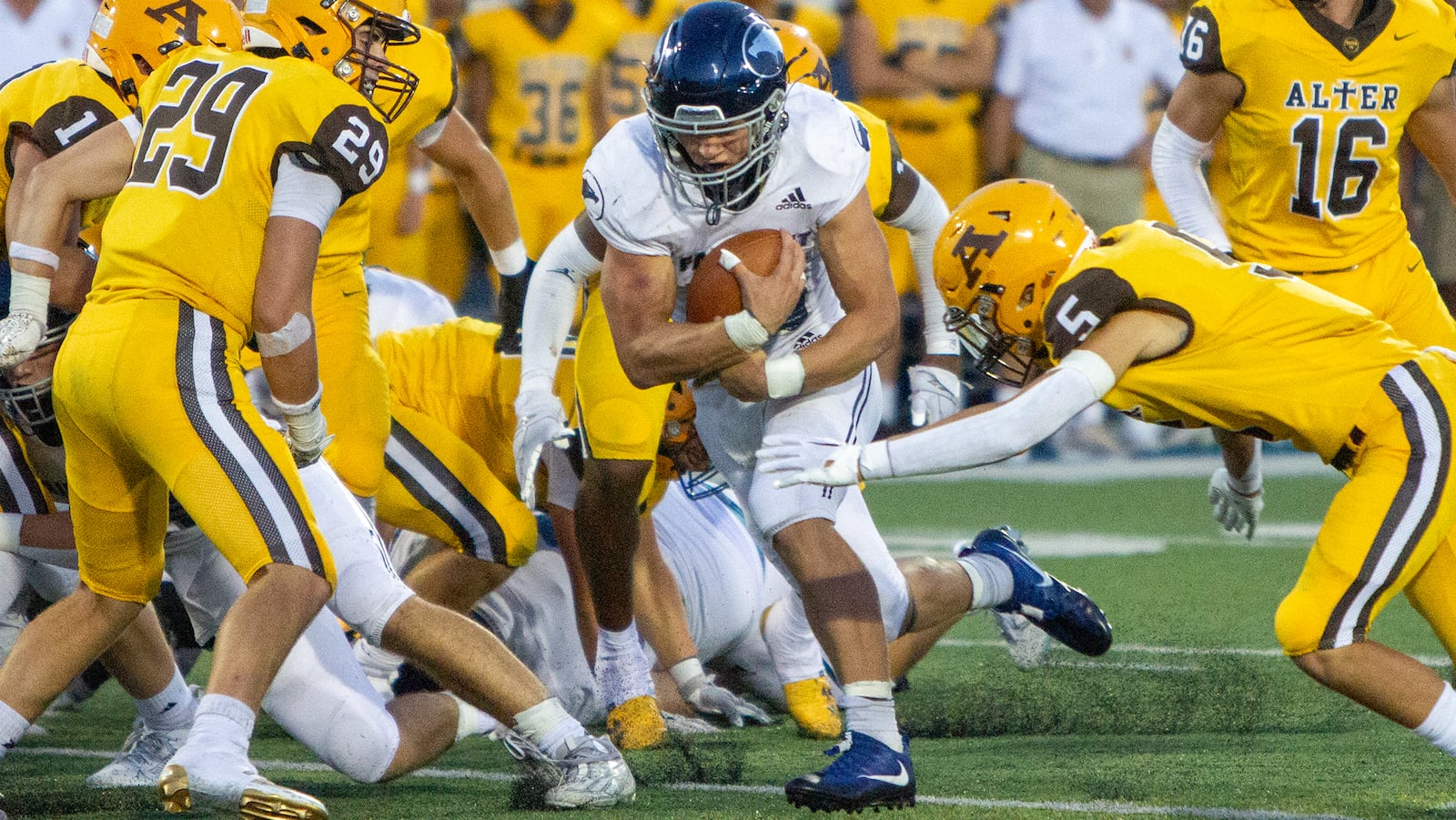 Fairmont's Logan Doty rushes for some of the 91 yards he gained on 26 carries in the Firebirds 24-7 win over Alter in 2024. Doty scored three 1-yard touchdowns. JEFF GILBERT/CONTRIBUTED