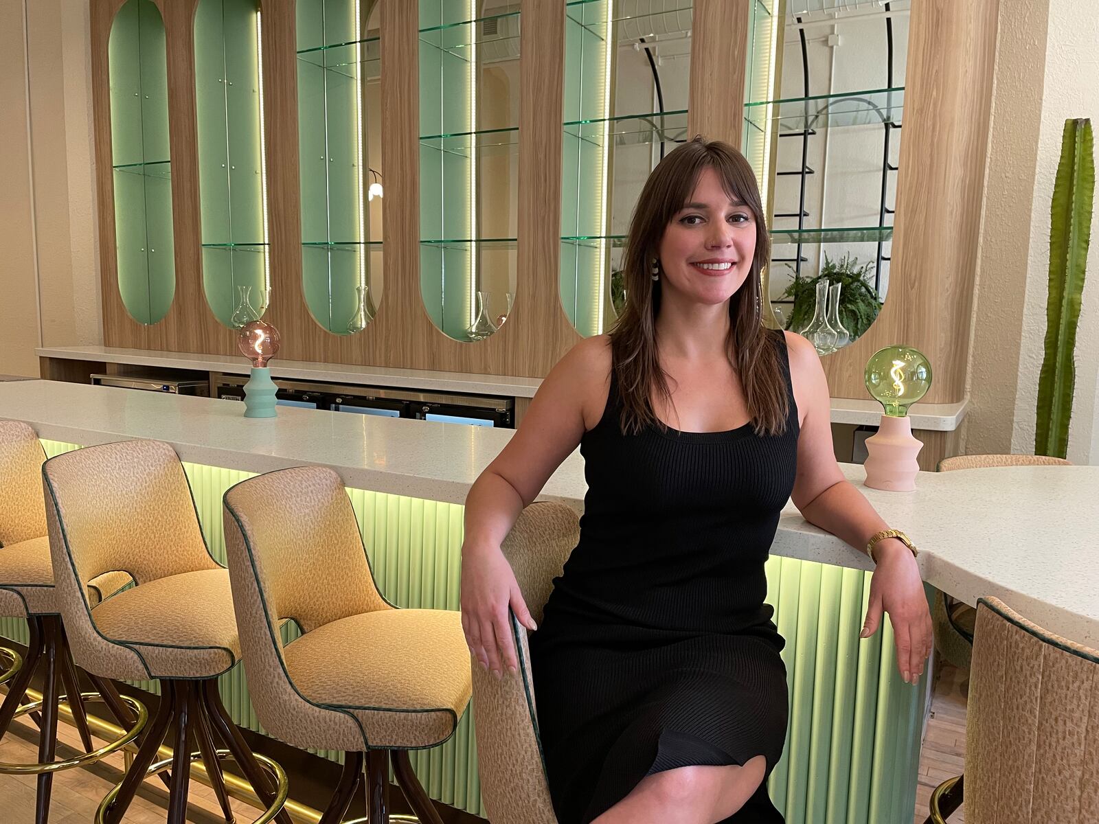 Joui, a wine retail shop and bar, is located at 117 E. Third St. next to Salt Block Biscuit Company in downtown Dayton’s Fire Blocks District. Pictured is owner Lauren Gay. NATALIE JONES/STAFF