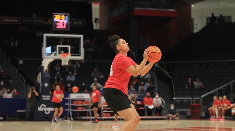 Dayton's Maliya Perry shoots at the Dayton Basketball Fan Fest on Saturday, Oct. 16, 2021, at UD Arena. David Jablonski/Staff