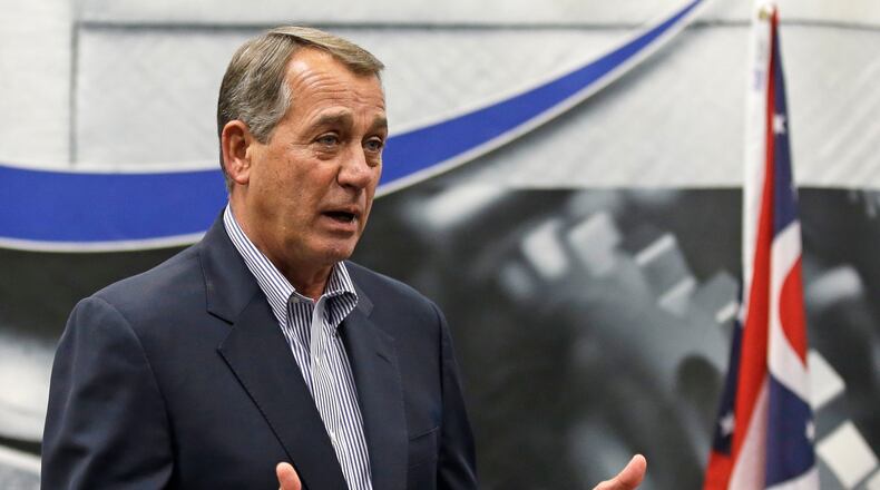 This Monday, May 5, 2014 photo shows House Speaker John Boehner speaking to employees during a tour of the Machintek Corp. plant in Fairfield, Ohio. He easily defeated two opponents in the GOP primary Tuesday, high school teacher J.D. Winteregg and businessman Eric Gurr in the Eighth District. (AP Photo/Al Behrman)
