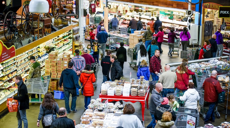 Shoppers pack the aisles at Jungle Jim’s International Market in Fairfield. STAFF FILE PHOTO