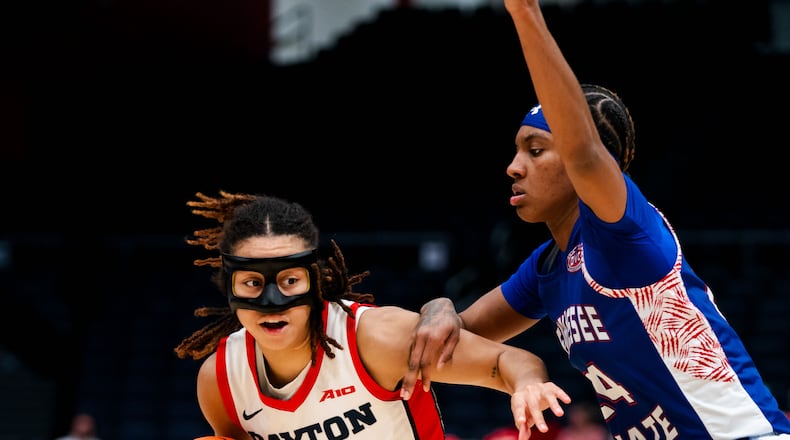 Dayton's Nayo Lear drives on Tennessee State’s Lyric Cole during the Flyers' 76-58 victory over the Tigers on Sunday at UD Arena. Erik Schelkun/UD Athletics