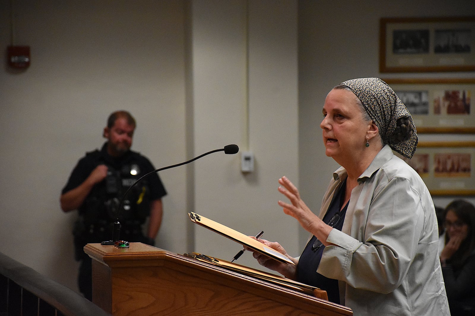Nancy Kiehl, a member of the Clergy Community Coalition, speaks at the Dayton City Commission meeting on Wednesday, July 23, 2025 after a citizen-initiative petition seeking a levy for a new public hospital failed. CORNELIUS FROLIK / STAFF