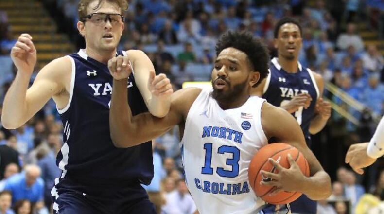 Yale's Eric Monroe, left, tries to stop North Carolina's Jeremiah Francis at Dean Smith Center on December 30, 2019 in Chapel Hill, North Carolina. (Photo by Streeter Lecka/Getty Images)