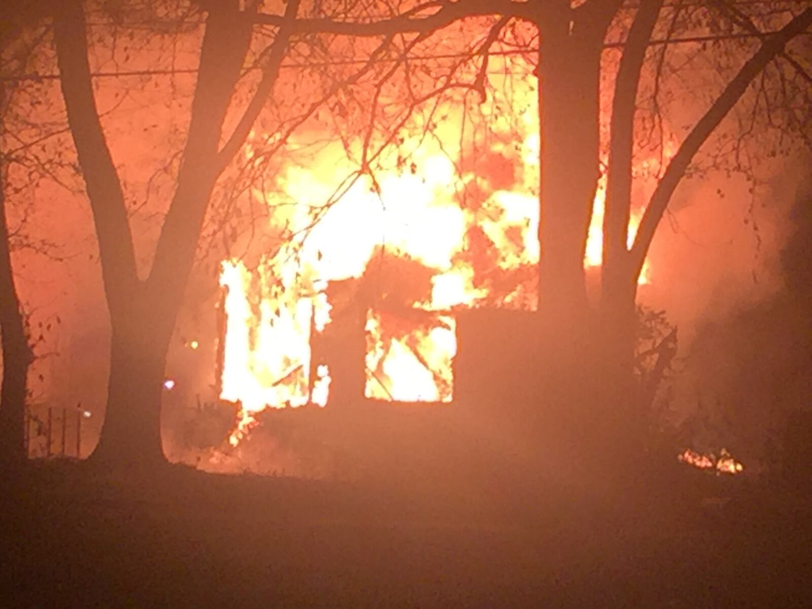 Fire in the 1100 block of West First Street, Dayton, Nov. 30, 2017. JAROD THRUSH/STAFF