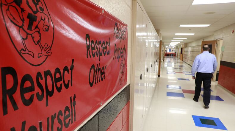 One of several signs in the hallways at Triad Middle School reminding students to respect themselves and others Tuesday. Bill Lackey/Staff