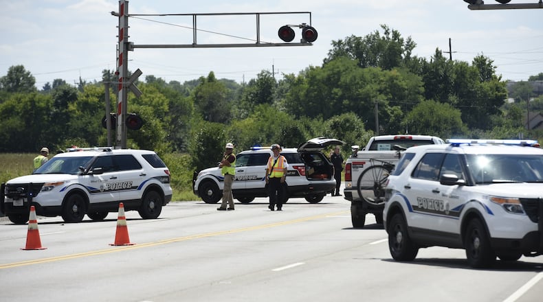 West Chester Twp. police are shutting down Ohio 747 between Port Union Road and Union Centre Boulevard due to a vehicle, train collision. NICK GRAHAM/STAFF